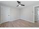 Modern bedroom showcases a contemporary ceiling fan and neutral walls at 2014 Poplar Rdg, Lawrenceville, GA 30044