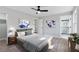 Stylishly furnished bedroom with soft gray tones, modern decor, and ensuite bathroom access at 2014 Poplar Rdg, Lawrenceville, GA 30044
