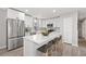 Well-equipped kitchen with an island, stainless steel appliances, and white cabinetry at 2014 Poplar Rdg, Lawrenceville, GA 30044