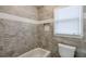 The bathroom showcases marble tiling and a large bath at 3285 Mitsy Forest Ne Way, Marietta, GA 30068