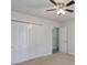 Bedroom with ample closet space, natural lighting and ceiling fan at 3285 Mitsy Forest Ne Way, Marietta, GA 30068