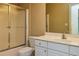 Neutral bathroom featuring a shower-tub combo, toilet, and white vanity at 418 Abbey Springs Way, Mcdonough, GA 30253