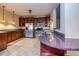 Kitchen featuring stainless steel appliances, wood cabinets, and granite countertops at 418 Abbey Springs Way, Mcdonough, GA 30253