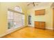 Bright, airy living room offers a large window, and view to the outdoor deck at 418 Abbey Springs Way, Mcdonough, GA 30253