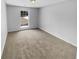 Bright bedroom with carpeting and natural light at 2412 Cheyenne Ln, Lawrenceville, GA 30044