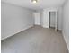 Empty bedroom with neutral walls and carpet at 2412 Cheyenne Ln, Lawrenceville, GA 30044