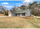 Charming ranch style home with mature landscaping and a well-maintained yard at 2412 Cheyenne Ln, Lawrenceville, GA 30044