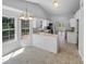 Bright eat-in kitchen features white cabinets and lots of natural light at 2412 Cheyenne Ln, Lawrenceville, GA 30044