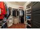 Organized closet with custom shelving and ample storage space for clothing and accessories at 827 Derrydown Way, Decatur, GA 30030