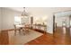 Bright dining room with hardwood floors and stylish furnishings at 827 Derrydown Way, Decatur, GA 30030