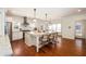 Modern kitchen featuring a large center island with seating, stainless steel appliances, and sleek countertops at 827 Derrydown Way, Decatur, GA 30030