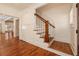 Beautiful staircase featuring hardwood steps and white wood risers at 827 Derrydown Way, Decatur, GA 30030