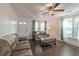 Bright living room with hardwood floors, natural light, and comfortable seating area at 1730 Lee Peters Rd, Loganville, GA 30052