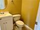 Cozy half bathroom featuring tile floors, white cabinets, and toilet at 2703 Regal Cir, Conyers, GA 30012
