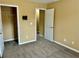 Bedroom with carpeted floors, neutral paint, and closet at 2703 Regal Cir, Conyers, GA 30012