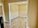 Living room featuring wood-look flooring at 2703 Regal Cir, Conyers, GA 30012