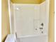 Bright bathroom shower with a modern showerhead and controls at 2703 Regal Cir, Conyers, GA 30012