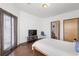 Spacious bedroom with hardwood floors, natural light, and an accessible patio at 898 Oak Sw St # 3222, Atlanta, GA 30310