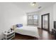 Cozy bedroom with hardwood floors, large windows, and ample natural light at 898 Oak Sw St # 3222, Atlanta, GA 30310