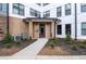 Close up shot of the condo's well maintained entrance with landscaping at 898 Oak Sw St # 3222, Atlanta, GA 30310