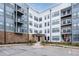 Modern condo building with balconies and manicured landscaping at 898 Oak Sw St # 3222, Atlanta, GA 30310