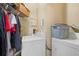 Functional laundry area equipped with a washing machine and dryer at 898 Oak Sw St # 3222, Atlanta, GA 30310