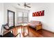 Living area featuring hardwood floors, bright windows and comfortable seating space at 898 Oak Sw St # 3222, Atlanta, GA 30310