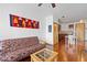 Bright living area with hardwood floors and an open floor plan to the kitchen space at 898 Oak Sw St # 3222, Atlanta, GA 30310