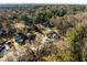 Aerial photo highlighting a neighborhood with mature trees and well-maintained homes at 1135 Banbury Cross, Avondale Estates, GA 30002