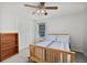 Bright bedroom featuring closet, ceiling fan, and neutral walls at 1135 Banbury Cross, Avondale Estates, GA 30002