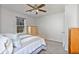 Bright bedroom with natural light, ceiling fan, and wood furniture at 1135 Banbury Cross, Avondale Estates, GA 30002