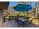 Charming deck with table and umbrella offering a relaxing outdoor space at 1135 Banbury Cross, Avondale Estates, GA 30002