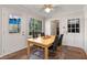 Cozy dining area with tile flooring, natural light, and outdoor views at 1135 Banbury Cross, Avondale Estates, GA 30002