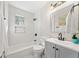 Updated bathroom featuring subway tile shower, updated vanity, and neutral decor at 817 N Evelyn Nw, Atlanta, GA 30318