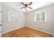 Well-lit bedroom featuring hardwood floors and a bright window for natural light and ventilation at 817 N Evelyn Nw, Atlanta, GA 30318
