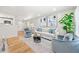 Bright living room featuring hardwood floors, modern furniture, and stylish decor at 817 N Evelyn Nw, Atlanta, GA 30318