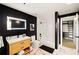 Modern bathroom features a lighted mirror, stylish vanity, and glass-enclosed shower at 170 Boulevard Se # H213, Atlanta, GA 30312