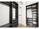 Walk-in closet with custom shelving and drawers, providing ample storage space at 170 Boulevard Se # H213, Atlanta, GA 30312