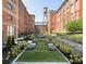 Beautifully landscaped courtyard with seating and manicured garden at 170 Boulevard Se # H213, Atlanta, GA 30312