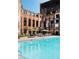 Inviting outdoor pool with lounge chairs and umbrellas at 170 Boulevard Se # H213, Atlanta, GA 30312