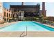 Inviting outdoor pool with lounge chairs and umbrellas at 170 Boulevard Se # H213, Atlanta, GA 30312