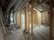 Unfinished basement with exposed wood framing, ductwork, and concrete flooring at 5210 Timber S Trl, Sandy Springs, GA 30342