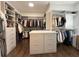 Walk-in closet with custom shelving and storage, offering ample space for clothing and accessories at 5210 Timber S Trl, Sandy Springs, GA 30342