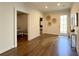 Welcoming entryway with hardwood flooring and a view to adjacent rooms at 5210 Timber S Trl, Sandy Springs, GA 30342