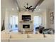 Cozy living room featuring a fireplace, shiplap walls, and access to a porch at 5210 Timber S Trl, Sandy Springs, GA 30342