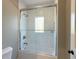 Bathroom with a tiled shower and glass door at 5210 Timber S Trl, Sandy Springs, GA 30342