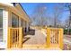 New wooden deck perfect for entertaining, featuring light natural wood at 9760 Greenside Way, Douglasville, GA 30135
