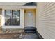 Close-up of the front door and entryway, showcasing the home's curb appeal at 9760 Greenside Way, Douglasville, GA 30135