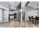 Bright open layout with hardwood flooring, dining room and stainless steel appliances at 9760 Greenside Way, Douglasville, GA 30135