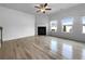 Bright living room with fireplace and sleek hardwood floors at 27 Crescent Chase, Dallas, GA 30157